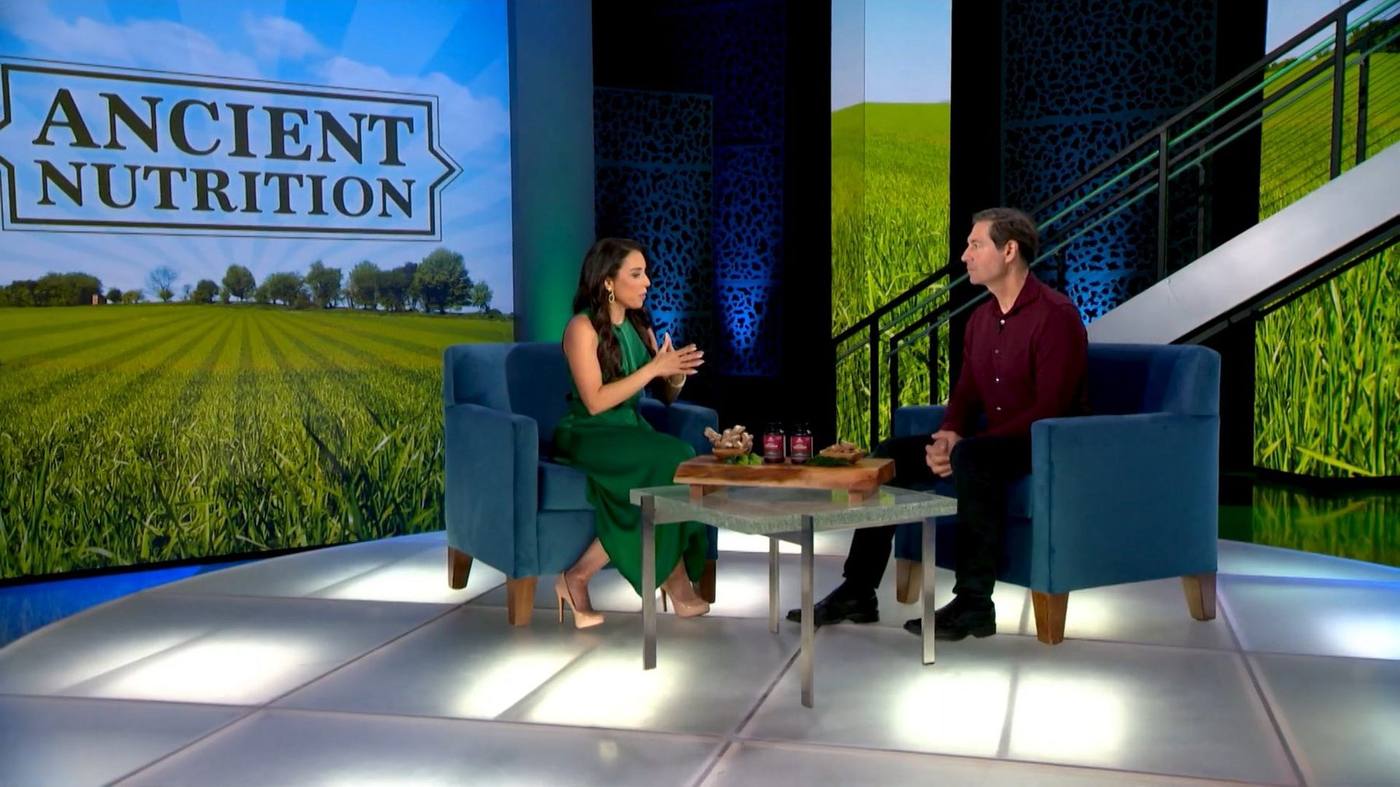 Host interview two-shot with the styled coffee table