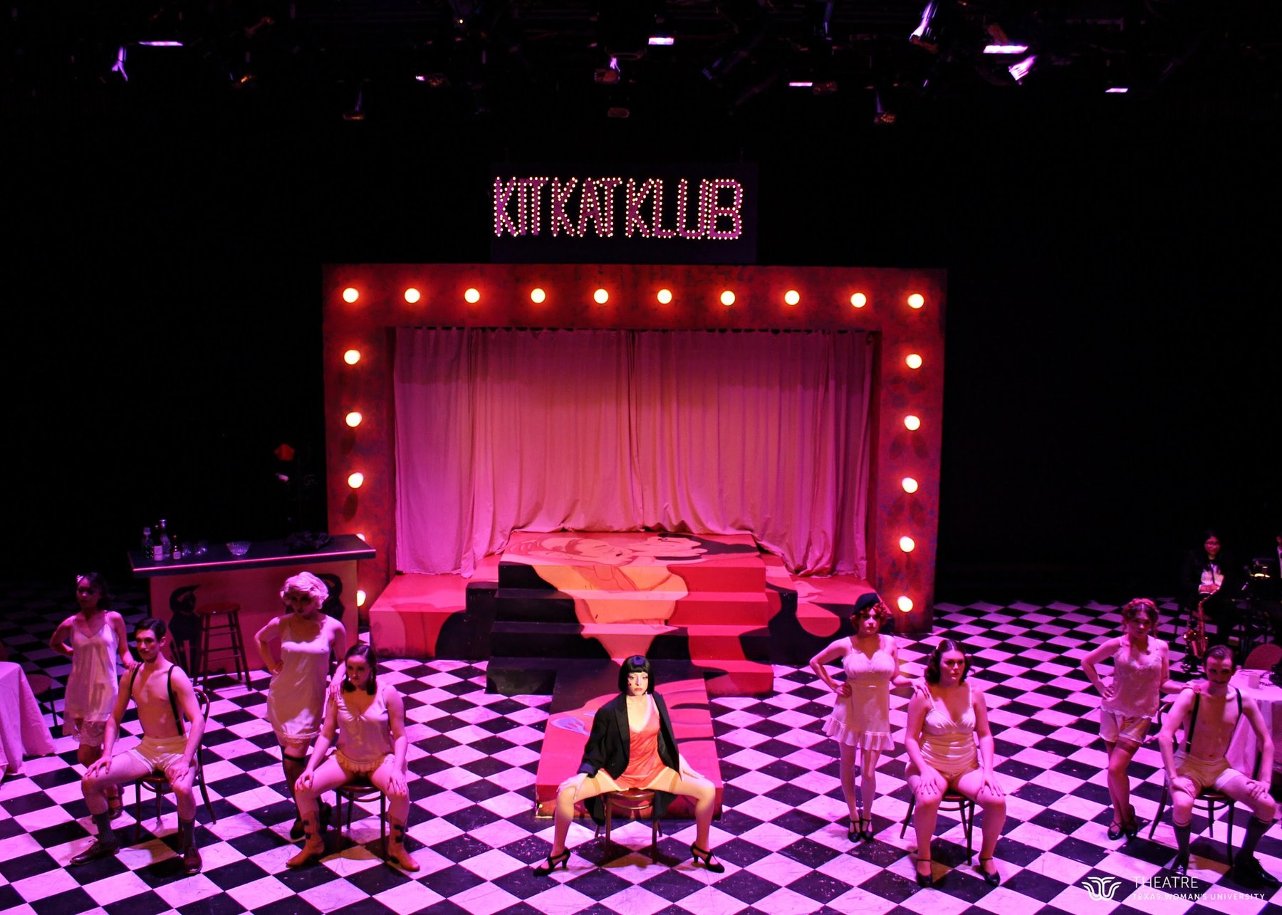 Cabaret — the Kit Kat Klub in full, Sally Bowles center on the checkerboard floor