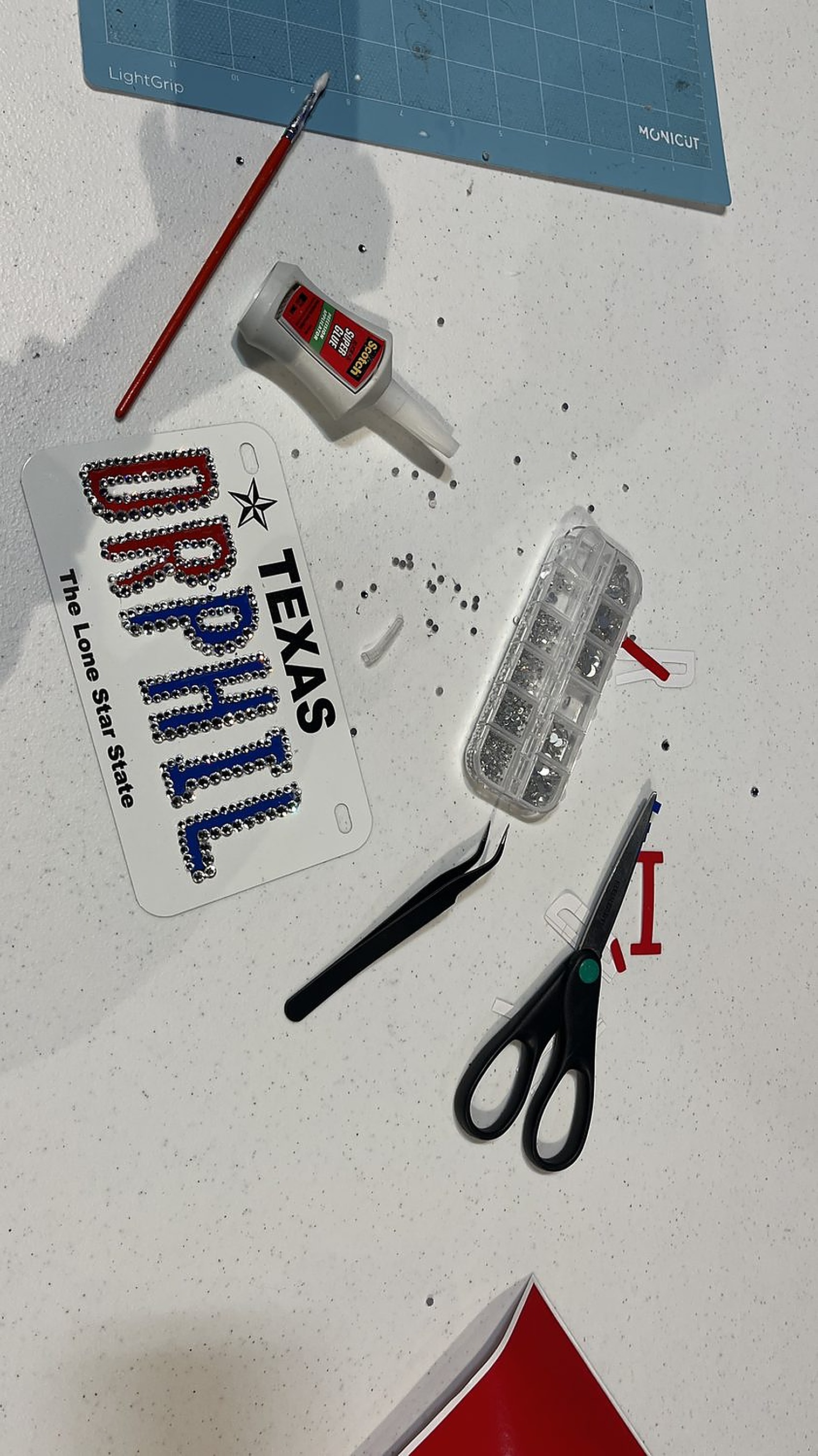Fabrication — rhinestone Texas plate prop