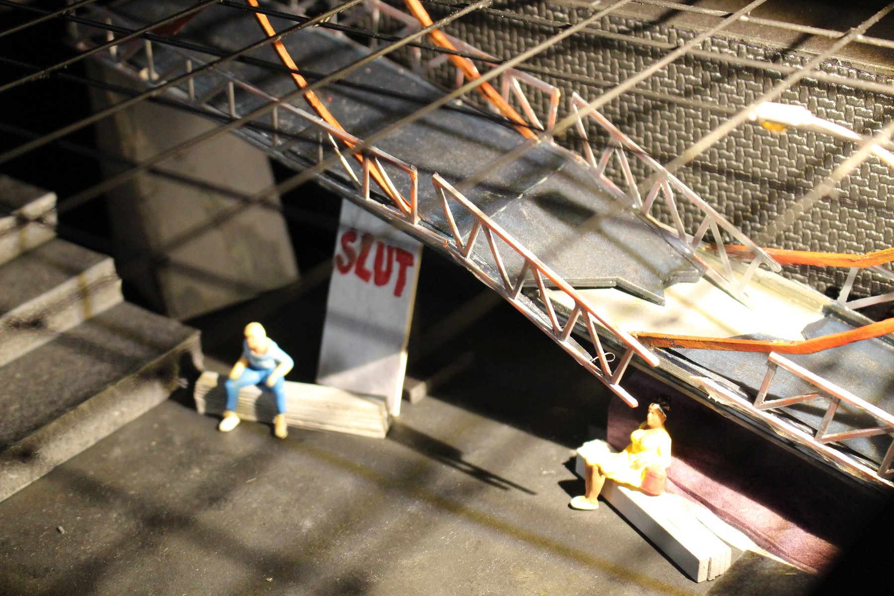 In the Blood — scale model of the collapsed overpass