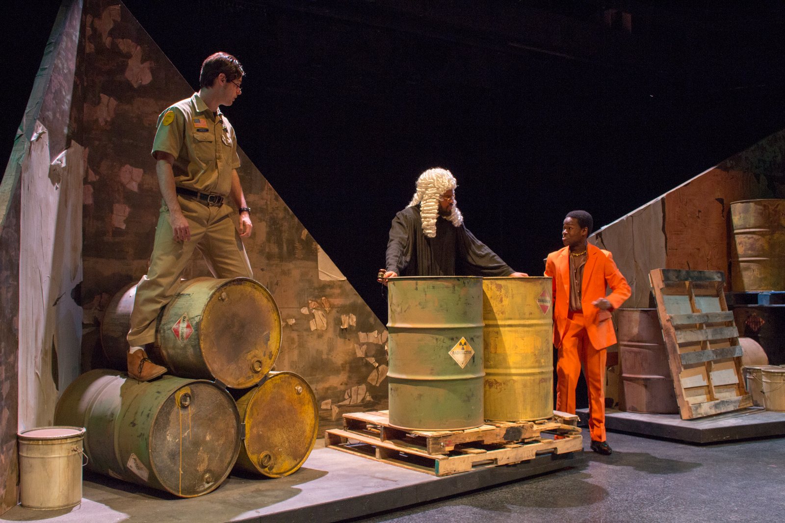 Production photo — judge's bench and drum platforms, dressed