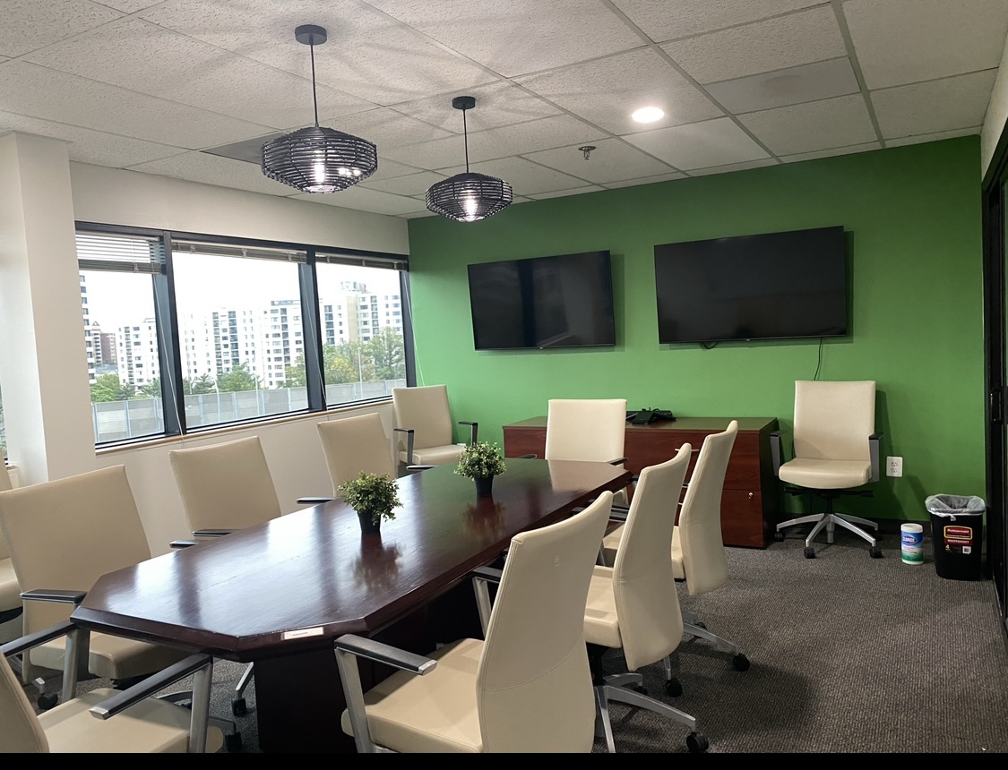Finished — conference room with green feature wall