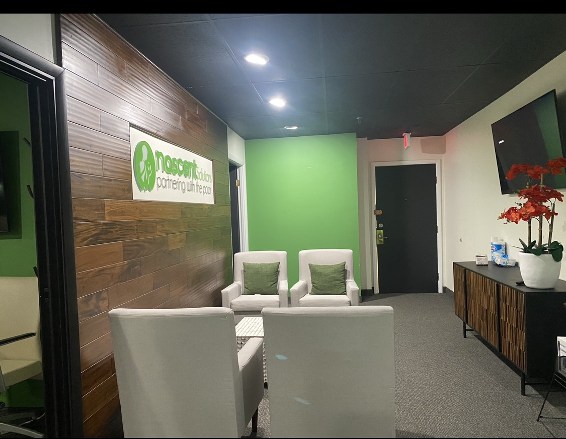 Finished — reception lounge and logo wall