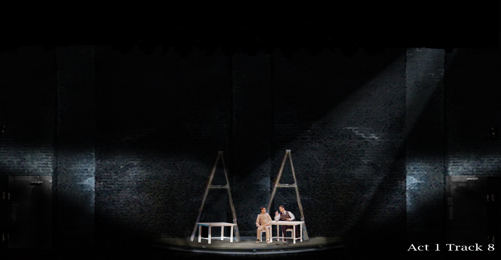 Act 1 — two figures at a table between the ladders in side light