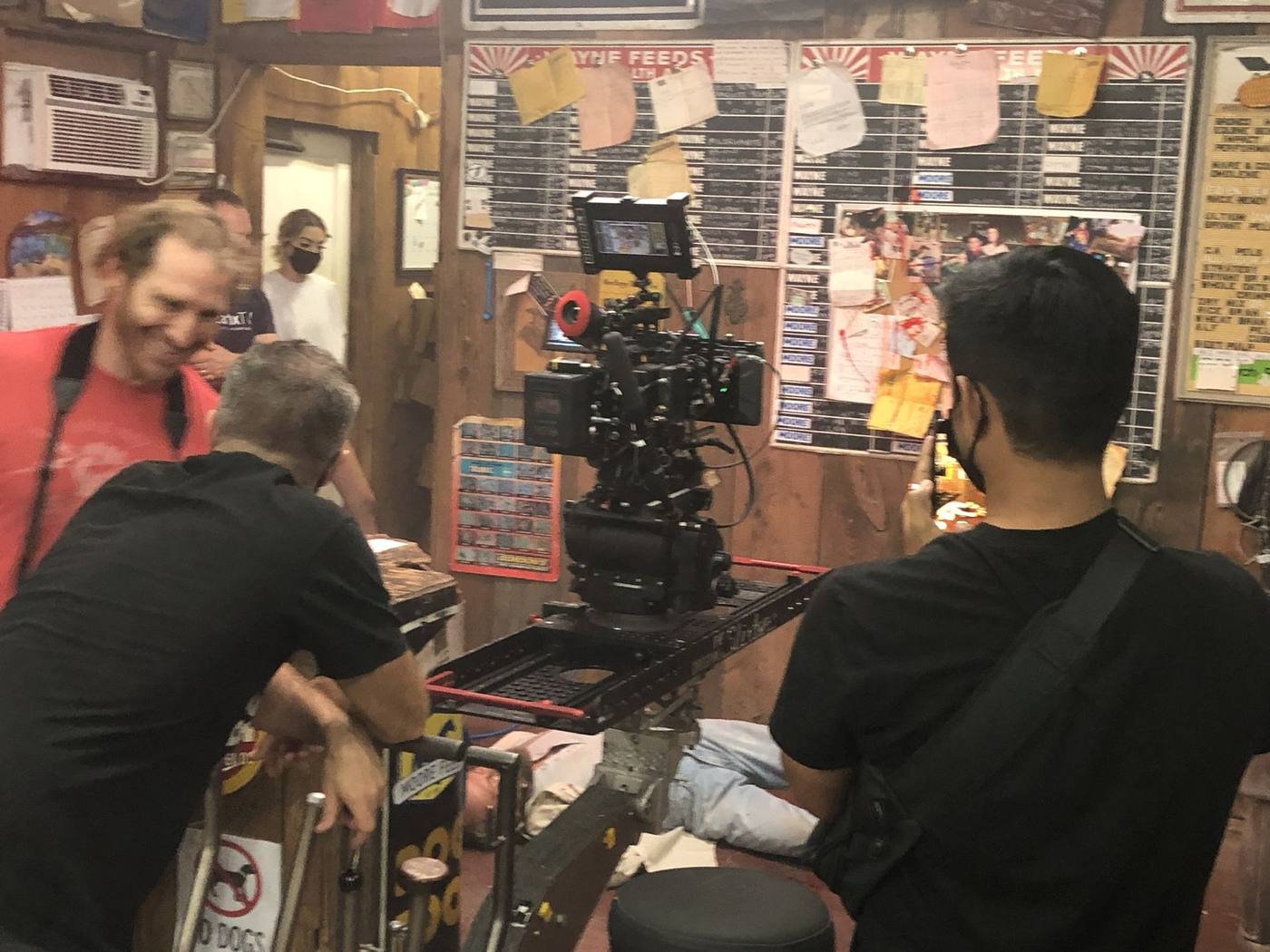 Camera crew inside the feed store