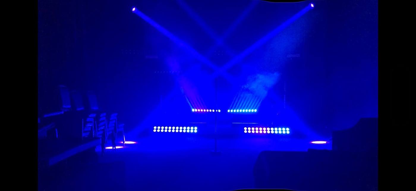 Vari-Lite Demo Room — deep blue aerial beams and strip state
