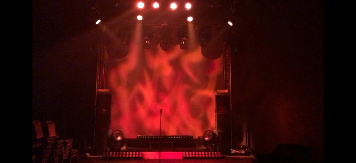 Vari-Lite Demo Room — flame gobo projected full width across the cyclorama