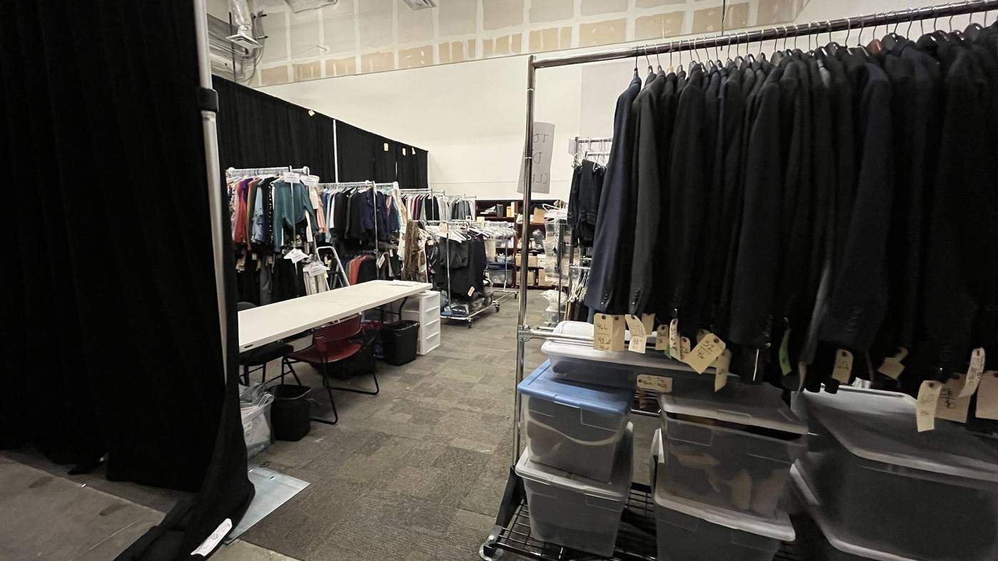 Wardrobe department — back warehouse with women's and men's sections
