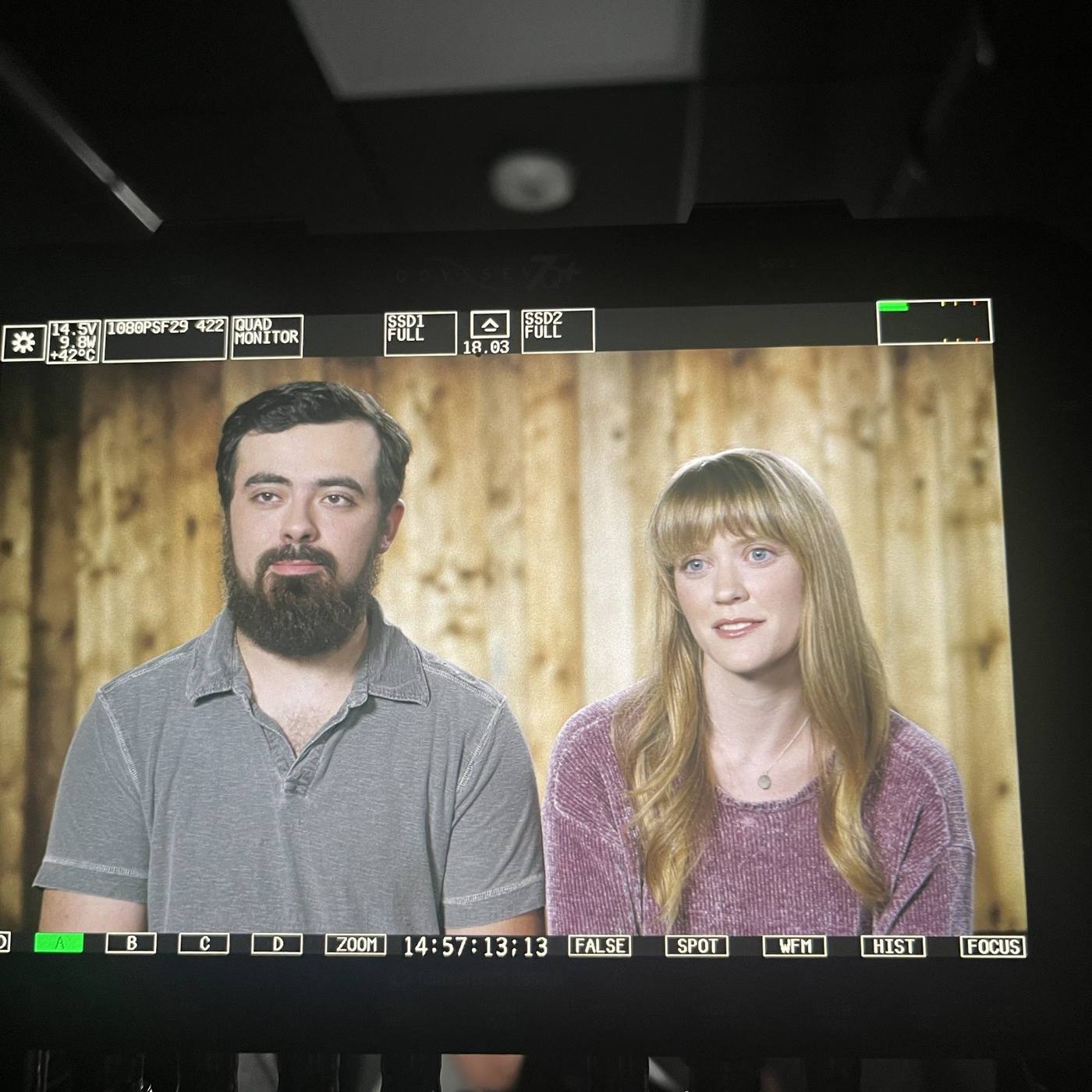 Camera monitor — couple interview styled for broadcast