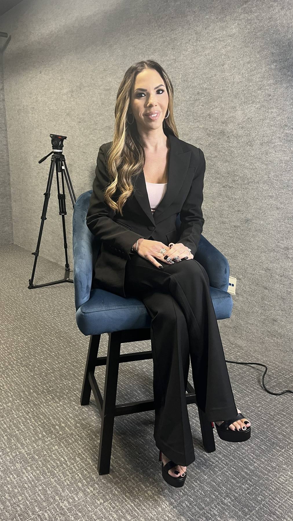 Guest fitting — black suit with platform heels